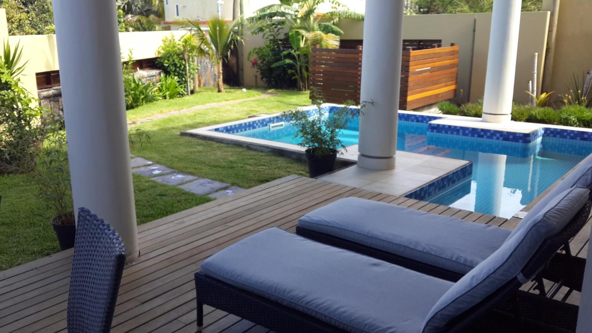 Villasun Luxury Apartments & Villas Flic en Flac Номер фото